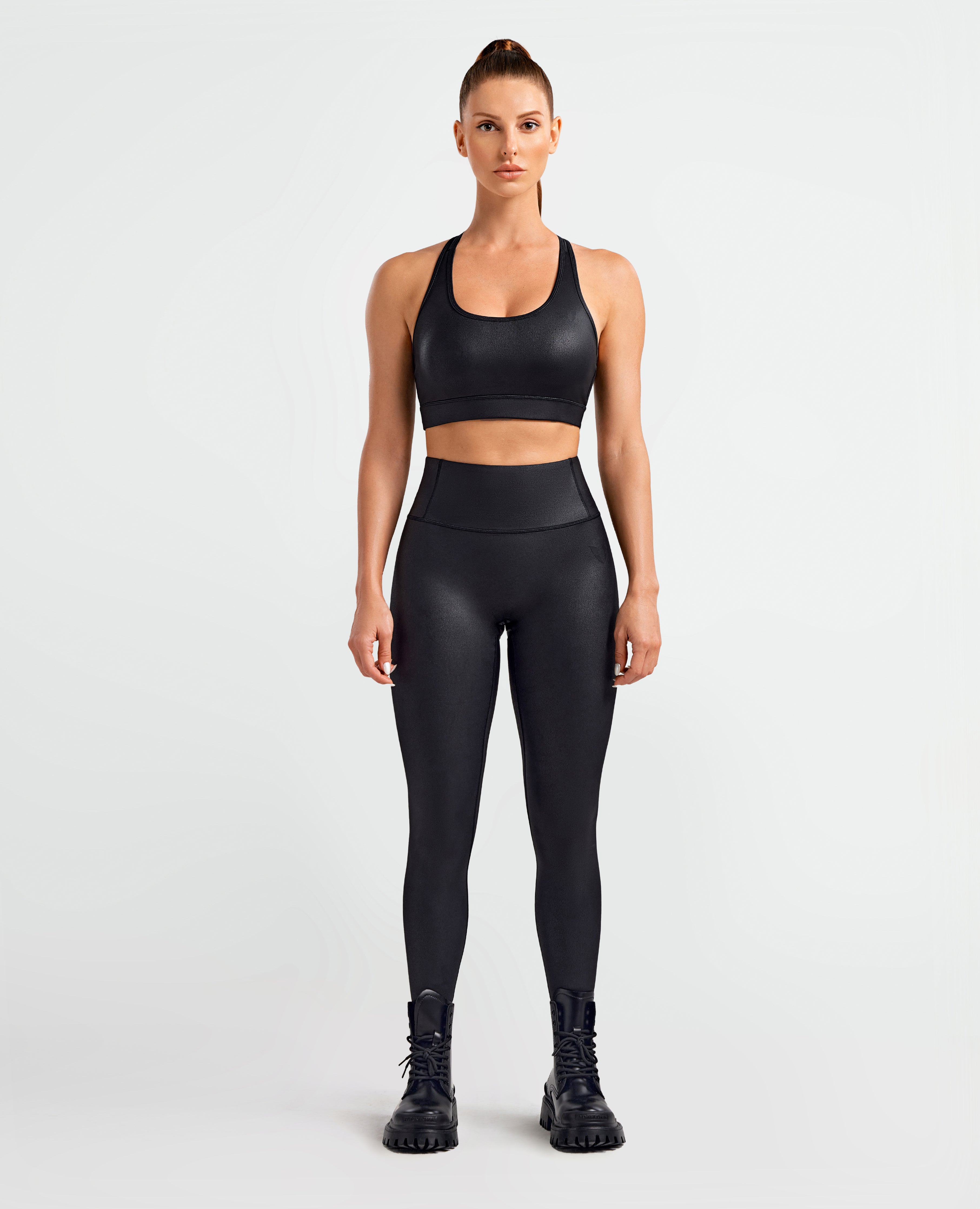 Leggings di energia cargo in pelle finta - nero